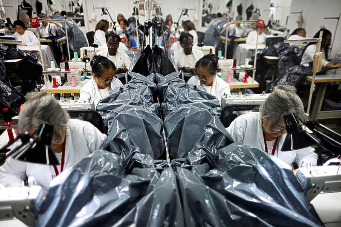 Venezuelan fashion workshop swaps  gowns for body bags after quakes